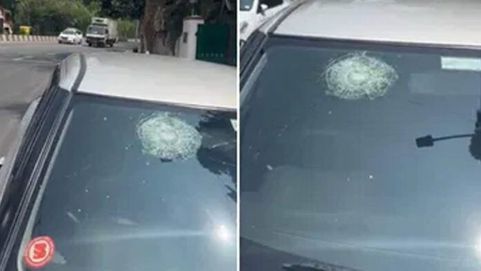 'golf ball' fell on a moving car